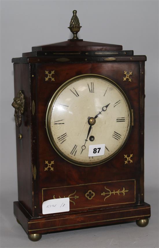 A Regency mahogany brass inlaid eight day bracket timepiece